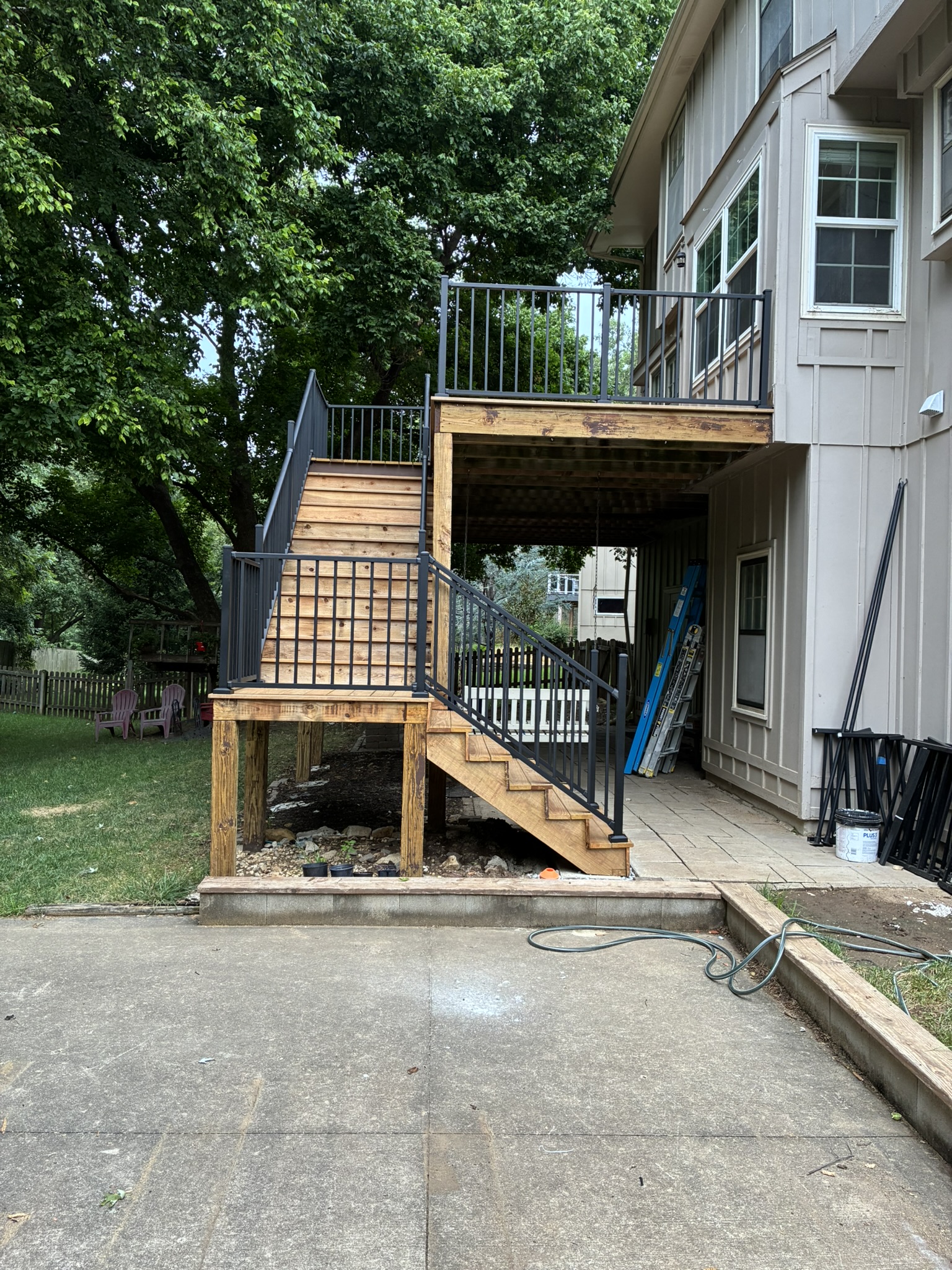 Screened porch with upper deck construction