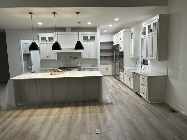 Kitchen remodel with white cabinets