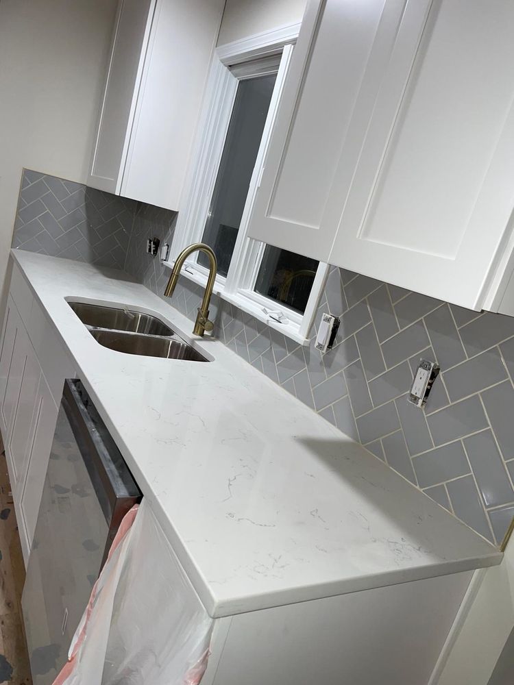 Kitchen counter with herringbone backsplash